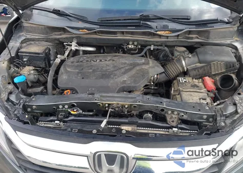 2018 Honda Odyssey Exl z USA, uszkodzony, nr VIN 5FNRL6H74JB096849